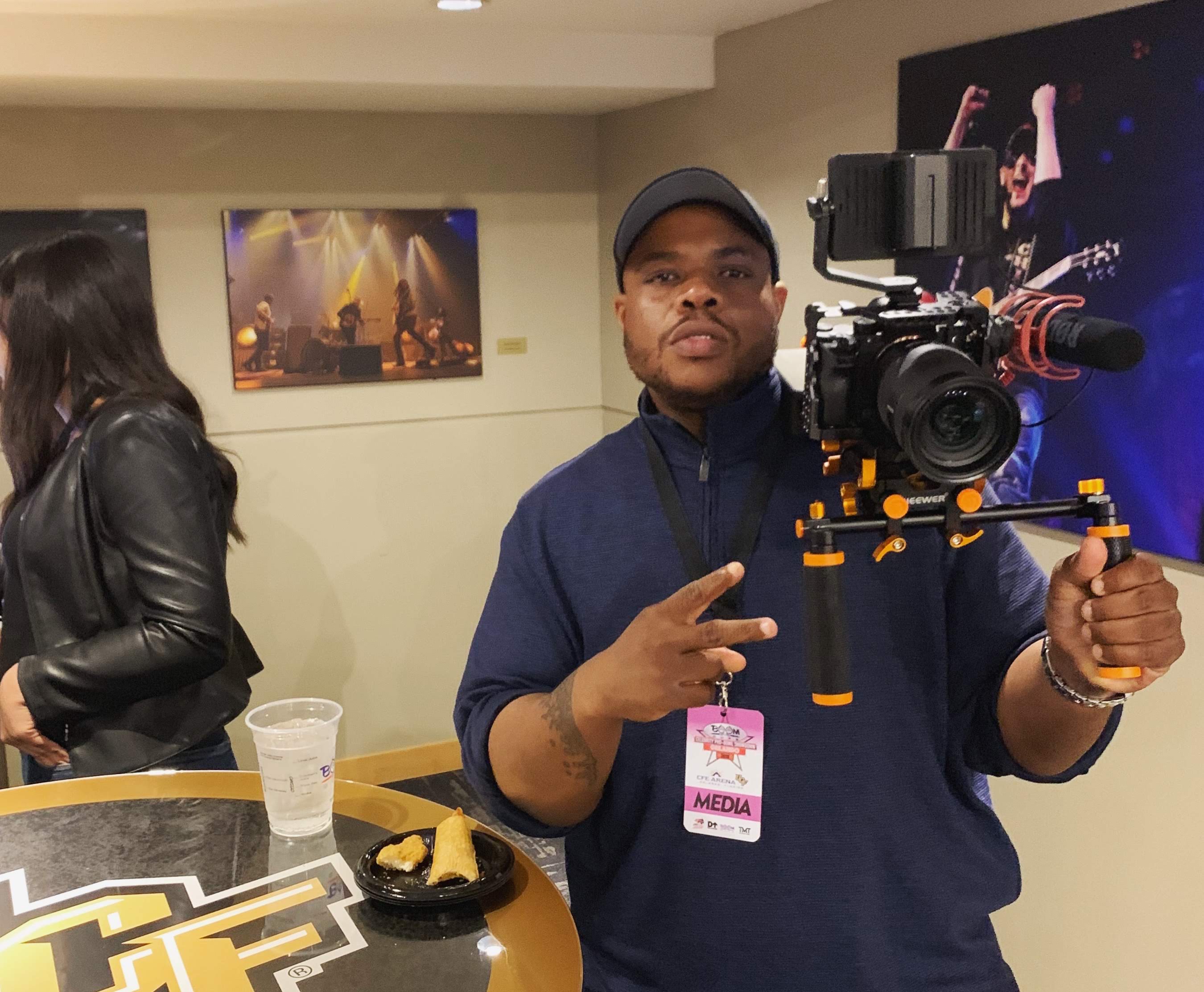 Director on set with professional cinema camera equipment