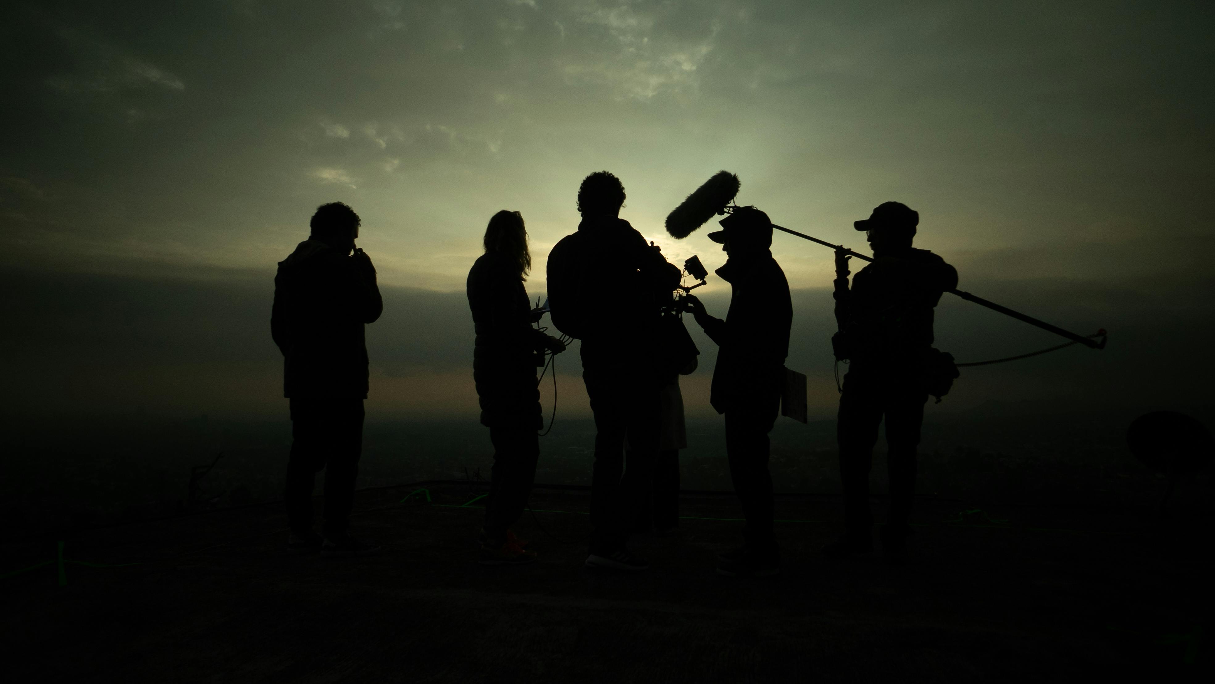 Professional film crew with production equipment